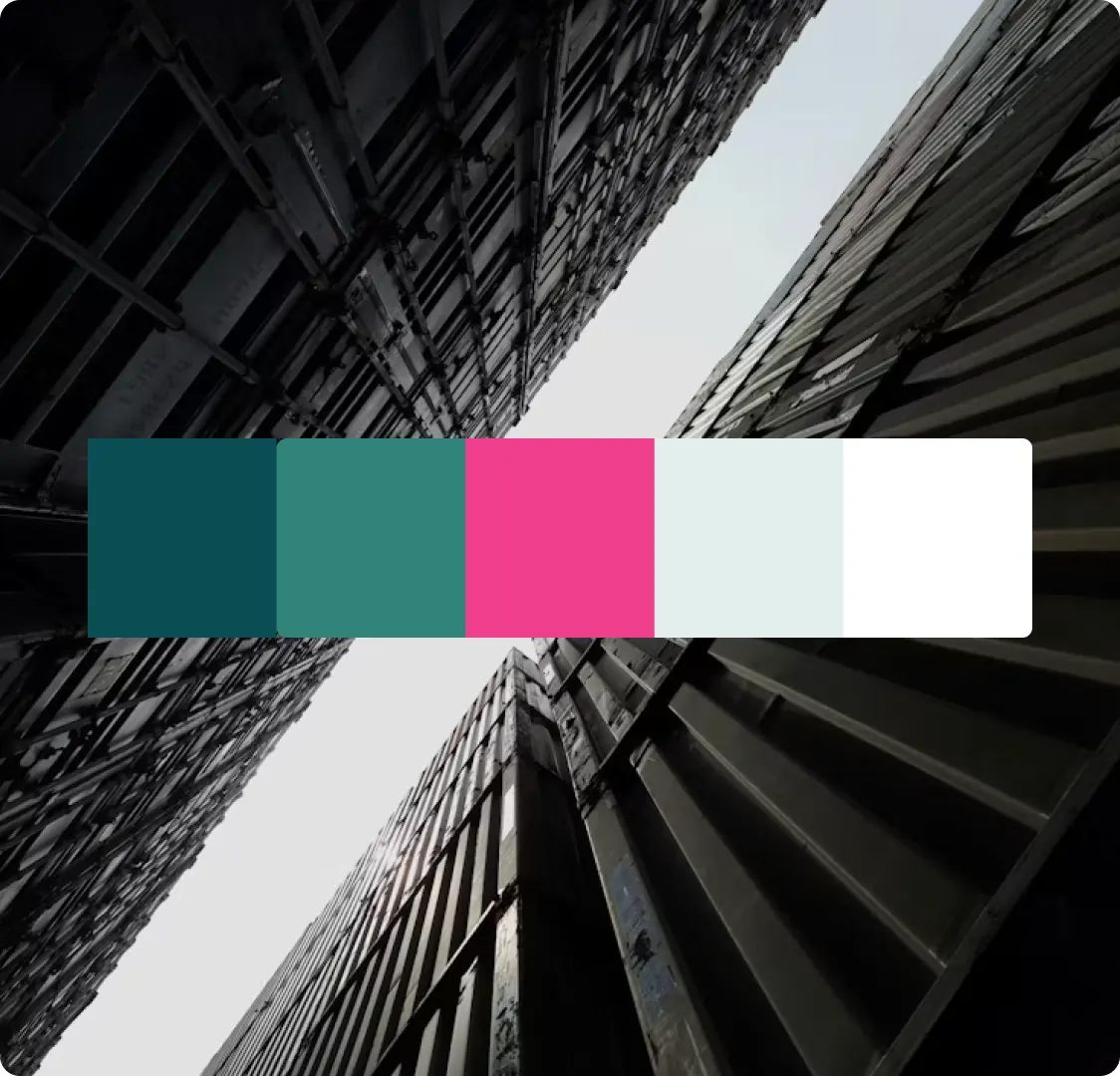 A five-colour swatch strip laid across a black and white photograph looking up between shipping containers.